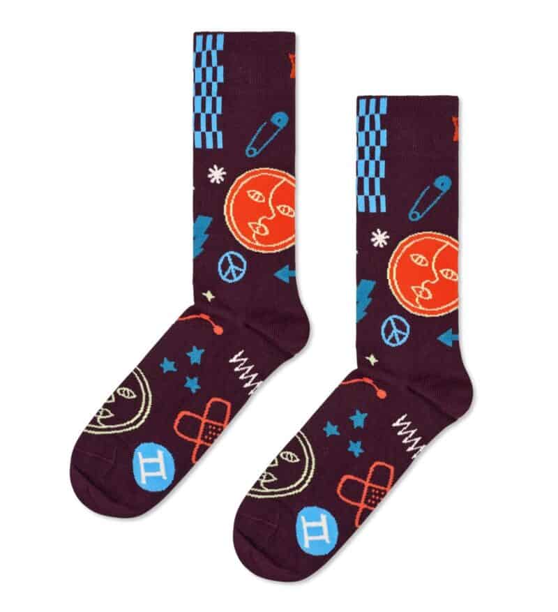 Themed socks with celestial and zodiac symbols.