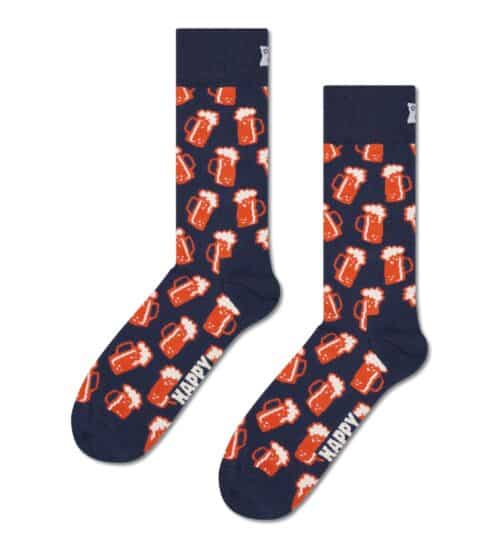 Cozy beer mug patterned socks in navy with orange and white accents, perfect for beer lovers.