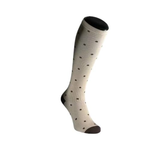 Support sock in bamboo with polka dot design for compression and comfort.