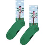 Bright green socks featuring a playful treehouse scene with clouds and a ladder.